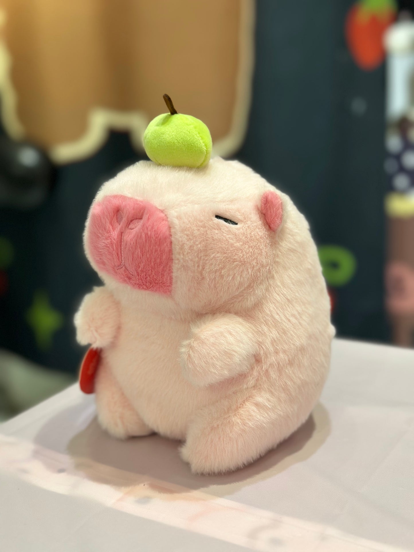 Peluche capibara rosa mela