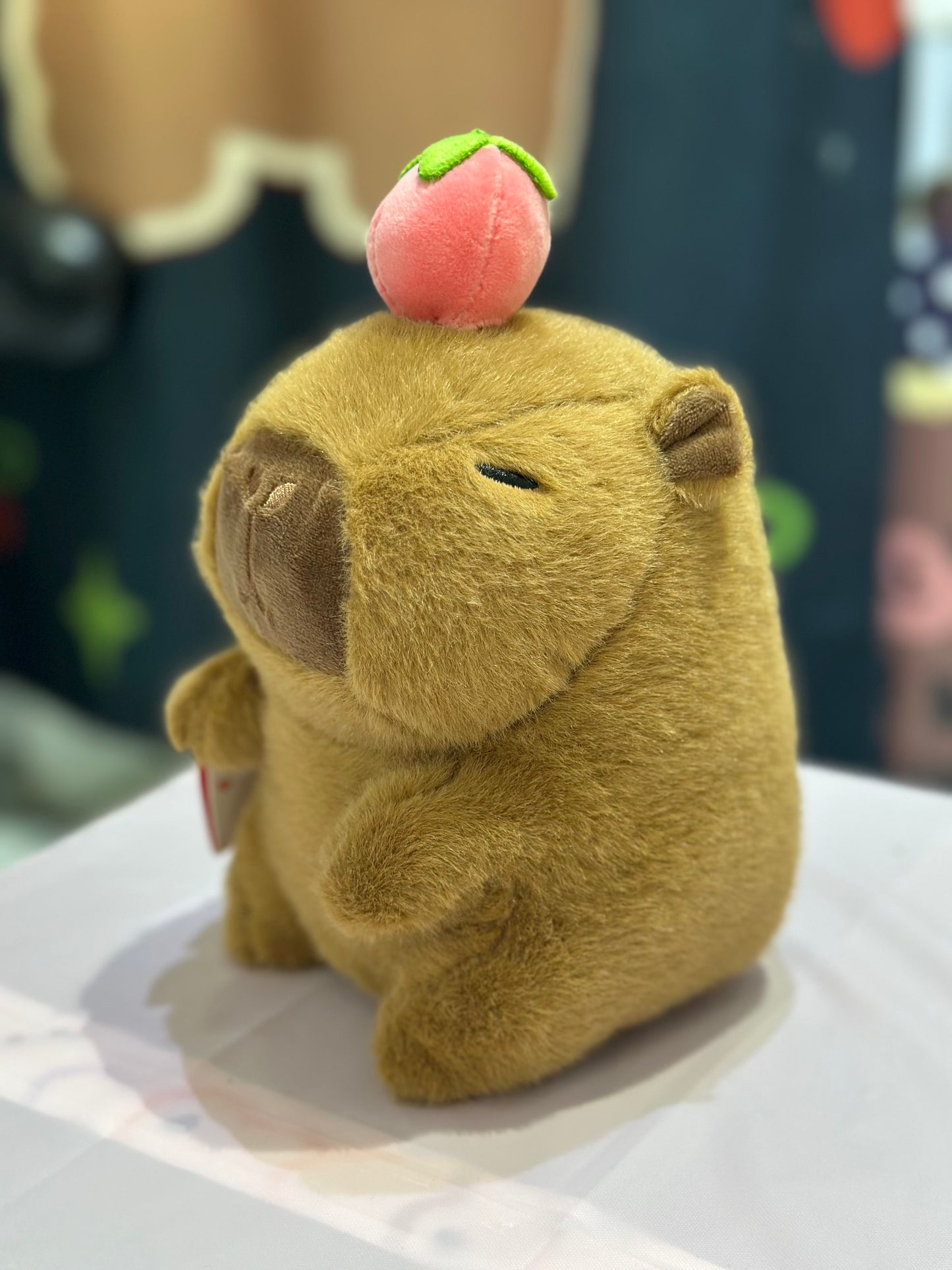 Peluche capibara con la pesca